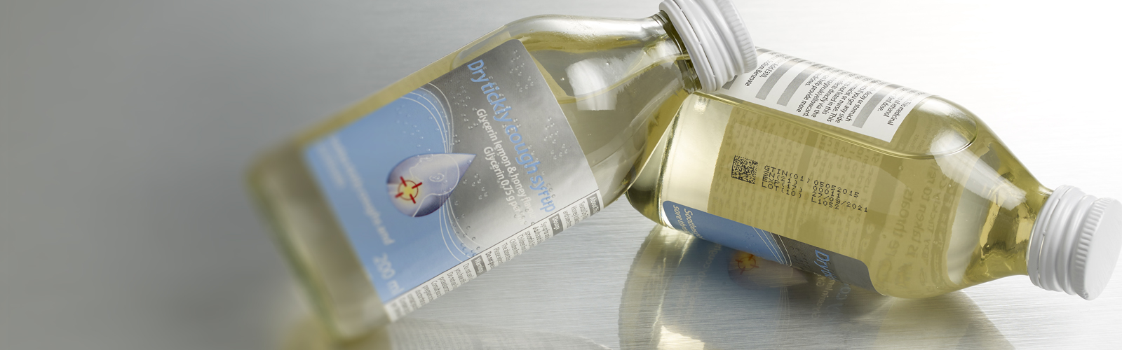 Industry-Lifesciences-Banner-Pharmaceuticals-Bottlesglass